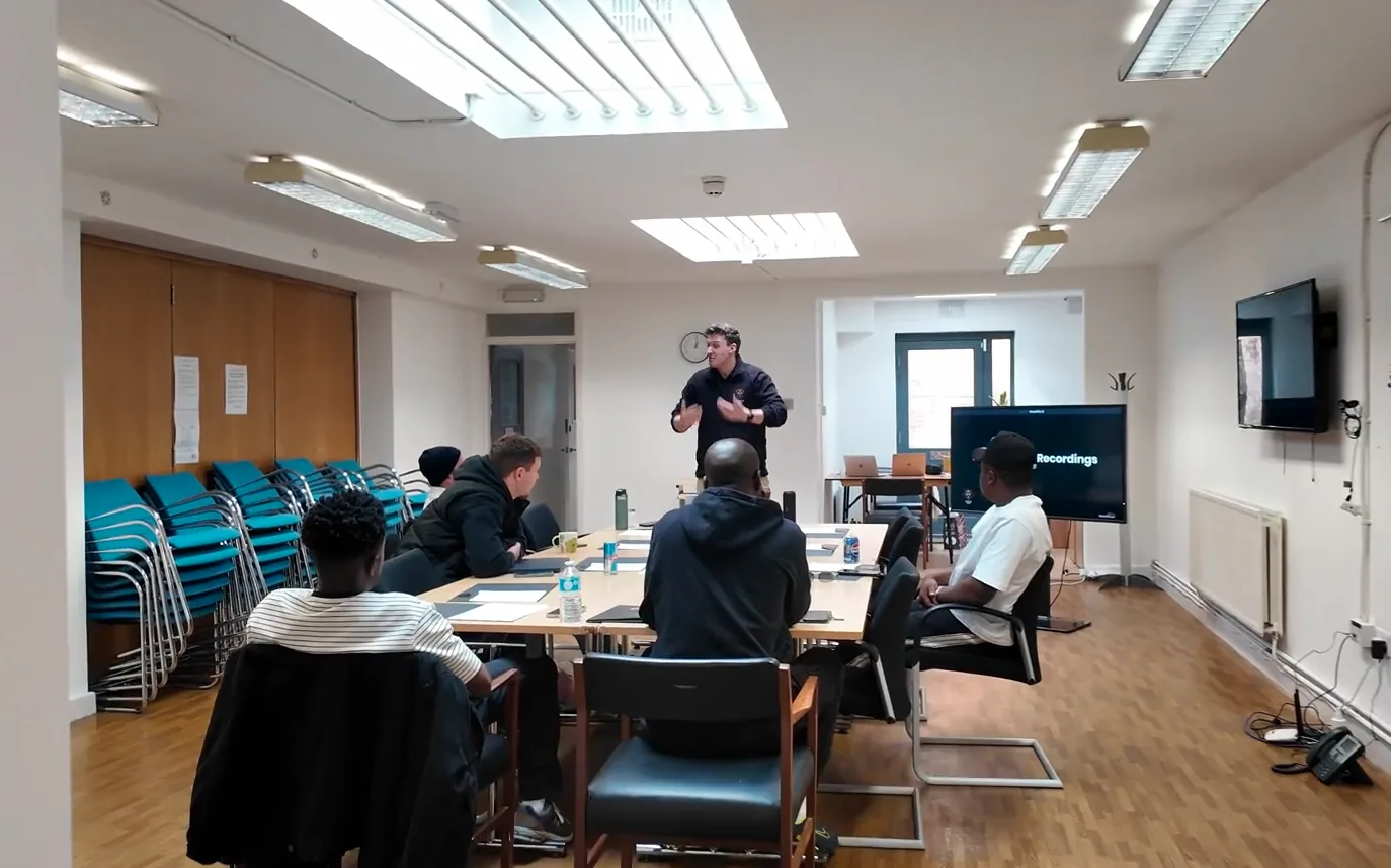 Lift Tec instructor leading an employment support session with students in the training room